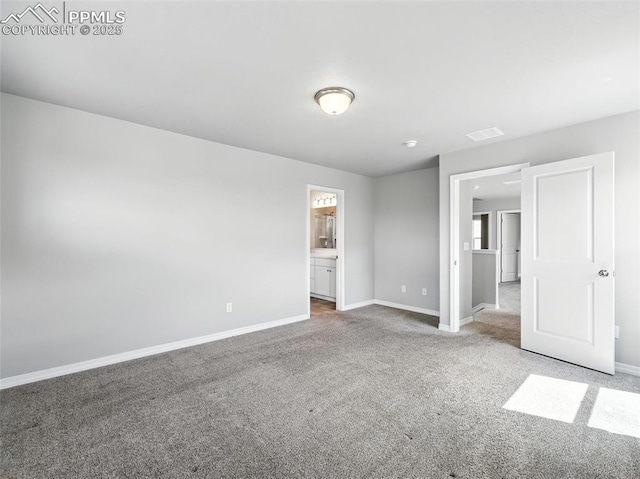 6222 Barr Pt, Colorado Springs, CO 80924 - unfurnished bedroom featuring carpet and connected bathroom