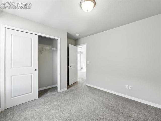 6222 Barr Pt, Colorado Springs, CO 80924 - unfurnished bedroom featuring carpet flooring and a closet
