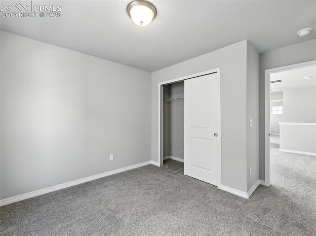 6222 Barr Pt, Colorado Springs, CO 80924 - unfurnished bedroom featuring carpet floors and a closet