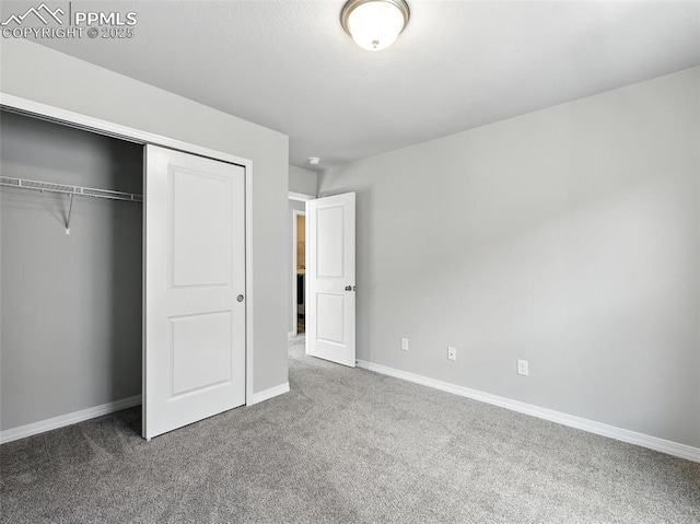 6222 Barr Pt, Colorado Springs, CO 80924 - unfurnished bedroom featuring carpet flooring and a closet