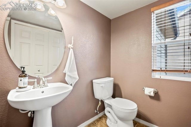 6372 Shooting Iron Way, Colorado Springs, CO 80923 - bathroom with healthy amount of natural light and tile patterned flooring