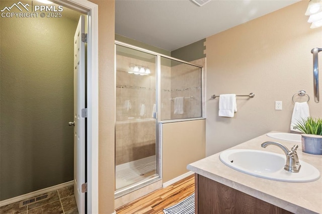 6372 Shooting Iron Way, Colorado Springs, CO 80923 - full bath featuring a stall shower and double vanity