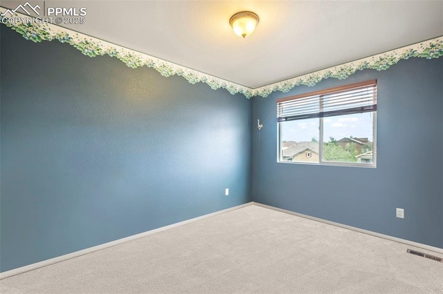 6372 Shooting Iron Way, Colorado Springs, CO 80923 - carpeted empty room featuring baseboards