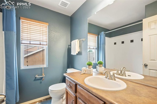 6372 Shooting Iron Way, Colorado Springs, CO 80923 - bathroom featuring vanity and a shower with shower curtain