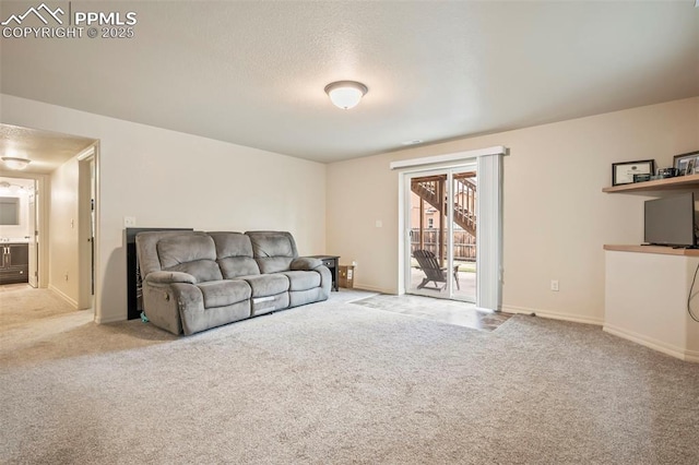 6372 Shooting Iron Way, Colorado Springs, CO 80923 - unfurnished living room featuring carpet and a textured ceiling