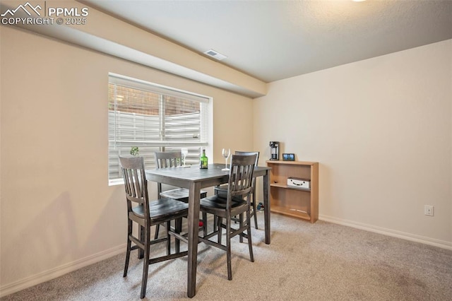 6372 Shooting Iron Way, Colorado Springs, CO 80923 - dining room with carpet flooring