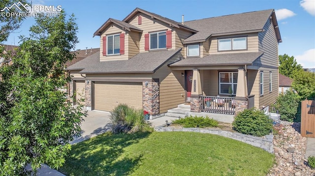 6372 Shooting Iron Way, Colorado Springs, CO 80923 - craftsman-style house with covered porch, roof with shingles, a garage, and concrete driveway