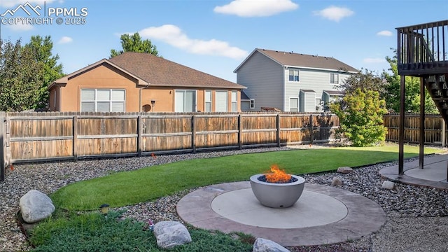 6372 Shooting Iron Way, Colorado Springs, CO 80923 - fenced backyard featuring a fire pit and a patio