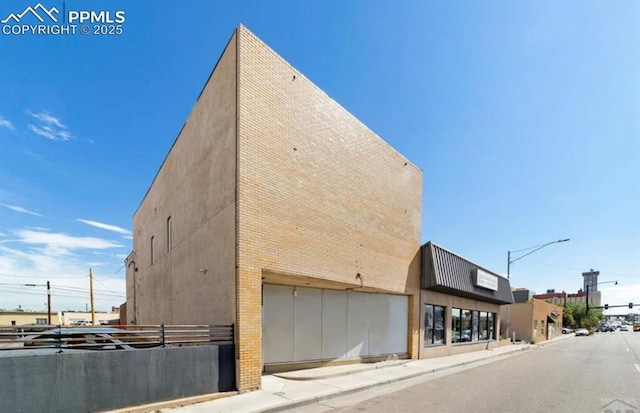 423 W 4th St, Pueblo, CO 81003 - view of building exterior with a garage