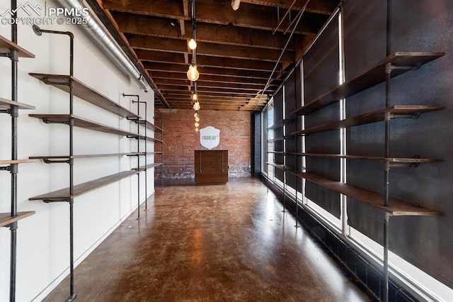 423 W 4th St, Pueblo, CO 81003 - basement featuring brick wall