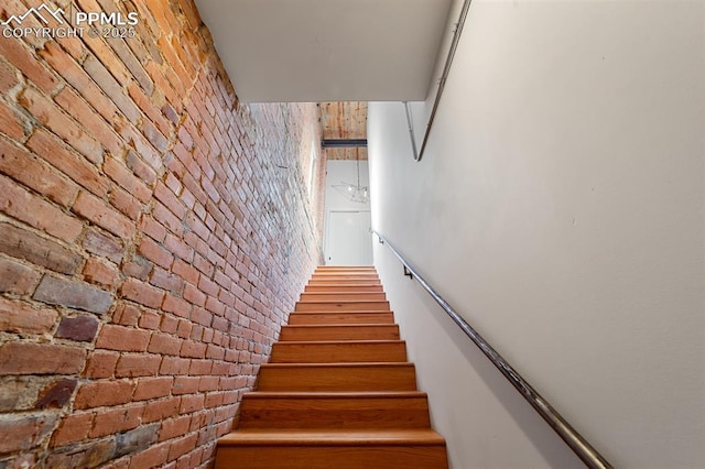 423 W 4th St, Pueblo, CO 81003 - stairway featuring brick wall