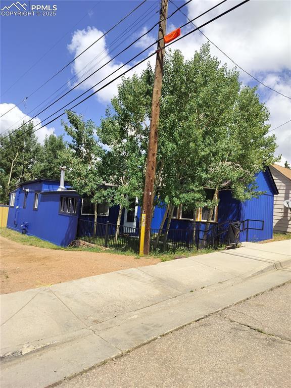 211 N 2nd St, Cripple Creek, CO 80813 - view of property hidden behind natural elements