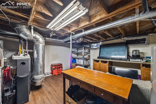 802 Alexander Rd, Colorado Springs, CO 80909 - unfinished basement featuring wood finished floors