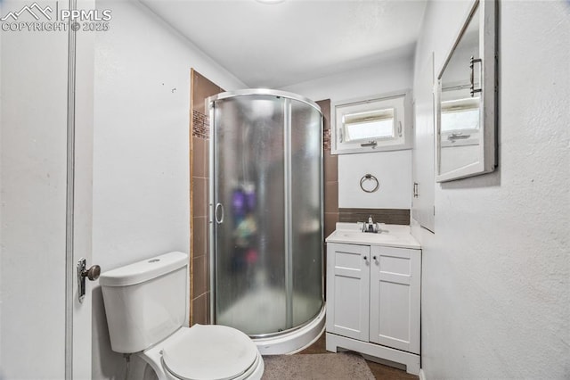 802 Alexander Rd, Colorado Springs, CO 80909 - bathroom with vanity and a stall shower