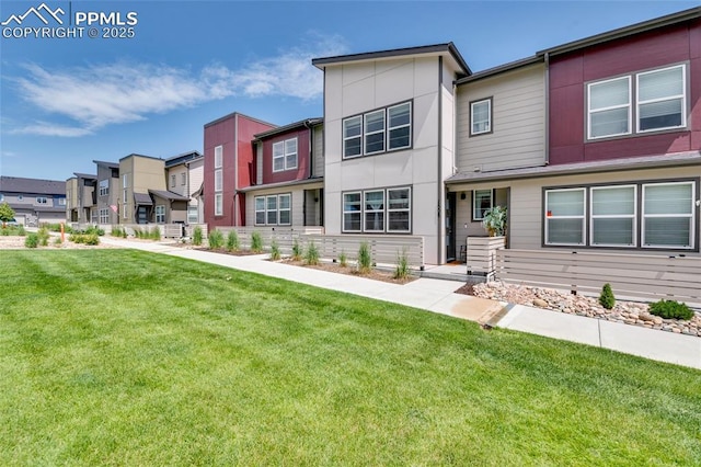 1608 Rose Quartz Hts, Colorado Springs, CO 80908 - view of front of house featuring a front yard and a residential view