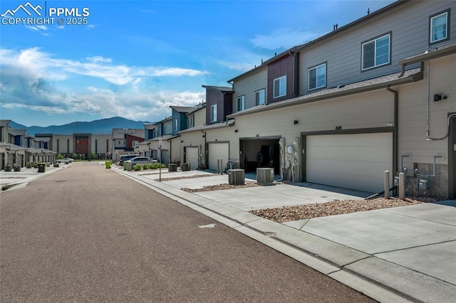 1608 Rose Quartz Hts, Colorado Springs, CO 80908 - view of asphalt road with a residential view and a mountain view