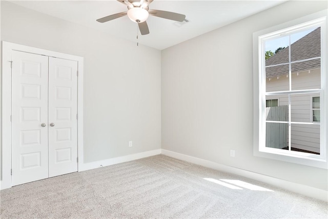 100 Hunters Way, Opelika, AL 36801 - unfurnished bedroom featuring carpet, a closet, a ceiling fan, and baseboards