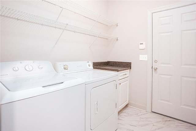 667 Carpenter Way, Auburn, AL 36830 - laundry area with independent washer and dryer, light marble finish floors, and cabinet space