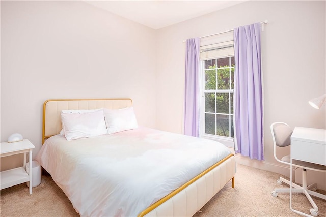 667 Carpenter Way, Auburn, AL 36830 - bedroom featuring light carpet and baseboards