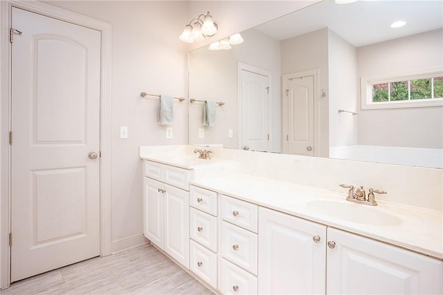 667 Carpenter Way, Auburn, AL 36830 - bathroom with double vanity and baseboards