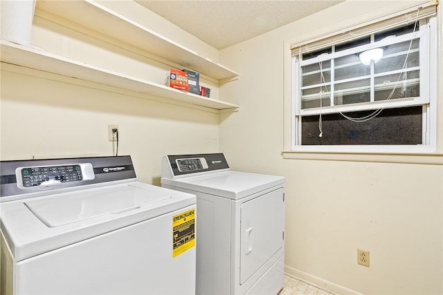 laundry room with washer and dryer