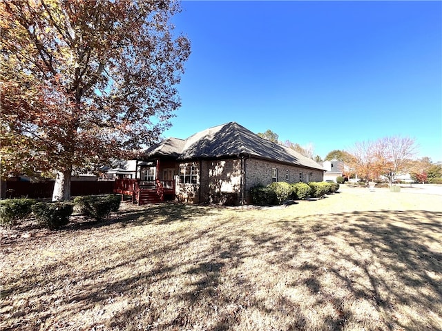 1807 Parsons Cir, Auburn, AL 36830 - view of side of home with a wooden deck