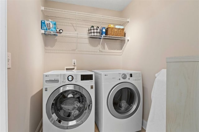 2260 Core Dr, Auburn, AL 36830 - laundry room with washing machine and dryer