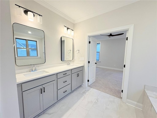 bathroom featuring vanity, ornamental molding, and ceiling fan