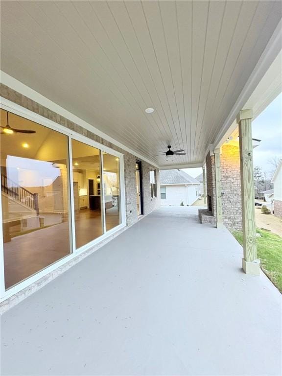 view of patio / terrace featuring ceiling fan