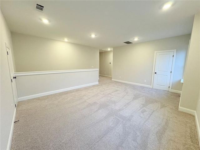 interior space featuring light colored carpet