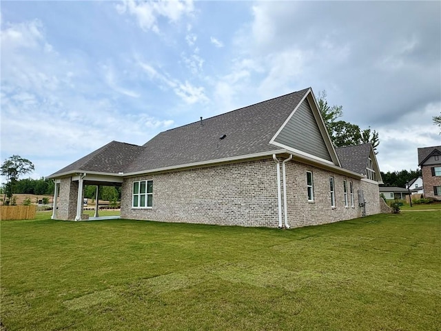 1649 James Burt Pkwy, Auburn, AL 36830 - back of house with brick siding, a yard, and a shingled roof