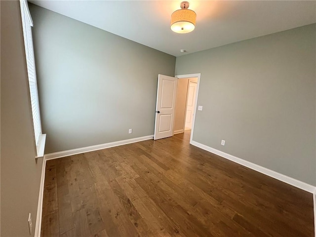 1649 James Burt Pkwy, Auburn, AL 36830 - unfurnished room featuring dark wood-style flooring and baseboards