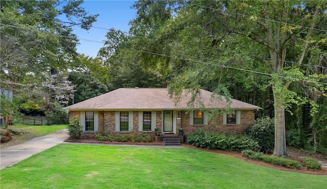 1324 Azalea Dr, Auburn, AL 36830 - ranch-style house featuring a front lawn, driveway, and brick siding