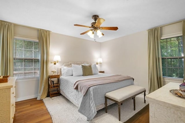 1324 Azalea Dr, Auburn, AL 36830 - bedroom featuring wood finished floors, baseboards, and a ceiling fan