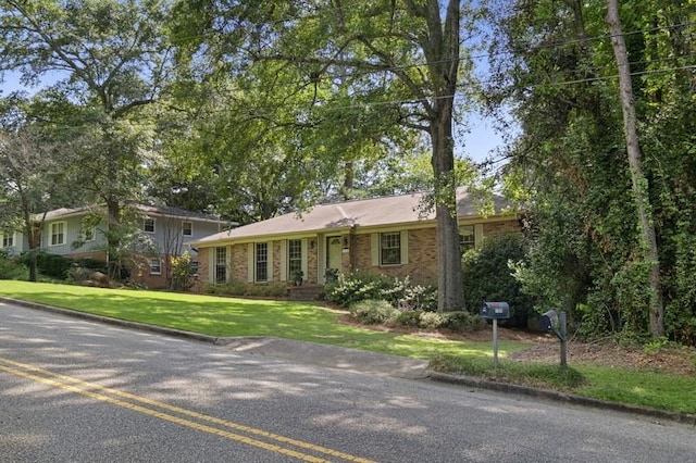 1324 Azalea Dr, Auburn, AL 36830 - view of front of home featuring brick siding and a front lawn