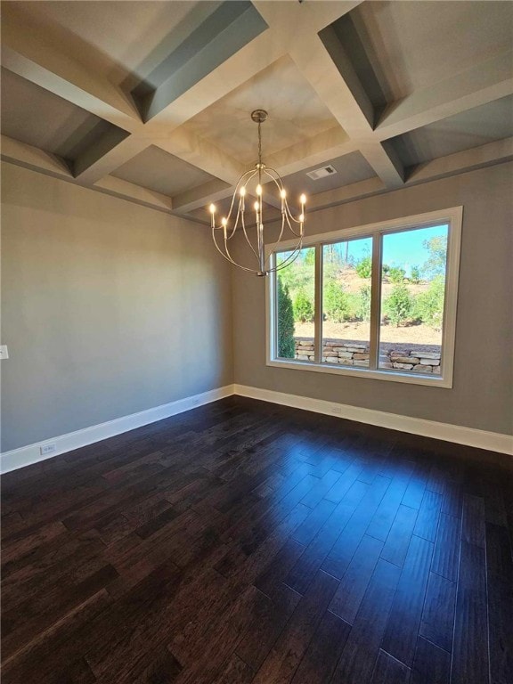 empty room with beamed ceiling, dark hardwood / wood-style floors, and an inviting chandelier