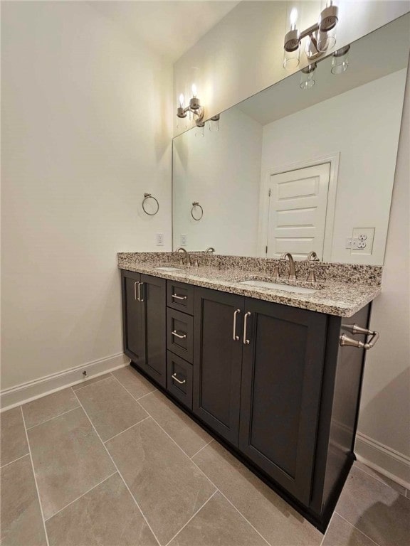 bathroom featuring vanity and tile patterned floors