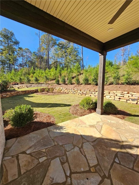 view of patio / terrace featuring ceiling fan