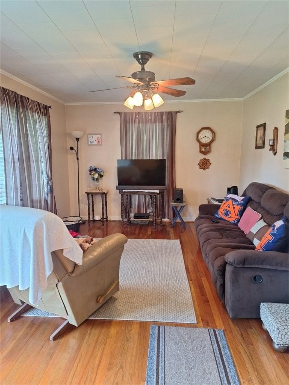 1701 53rd St, Valley, AL 36854 - living room featuring ceiling fan, wood finished floors, and crown molding