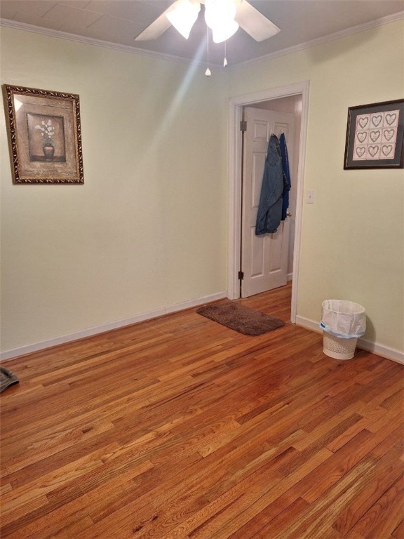 1701 53rd St, Valley, AL 36854 - spare room with light wood-type flooring, ornamental molding, and a ceiling fan