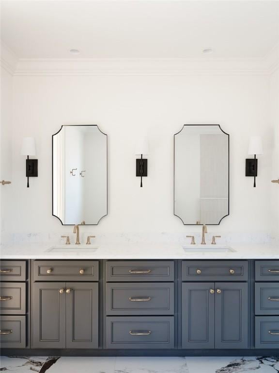 bathroom featuring crown molding and vanity