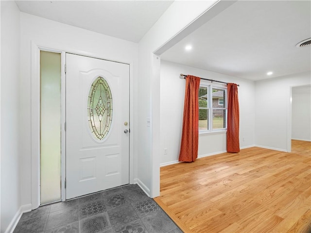 entryway with wood-type flooring