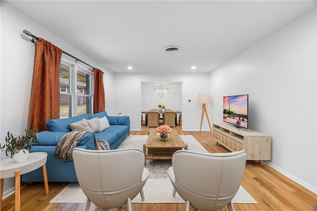 living room with hardwood / wood-style flooring