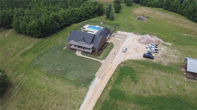 birds eye view of property featuring a rural view