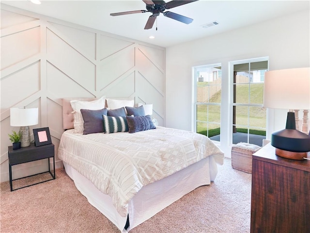 016 Crossing Ct E, Valley, AL 36854 - bedroom with light carpet, recessed lighting, a decorative wall, and a ceiling fan