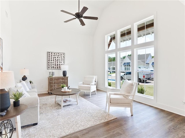 016 Crossing Ct E, Valley, AL 36854 - living room featuring high vaulted ceiling, wood finished floors, a ceiling fan, and baseboards