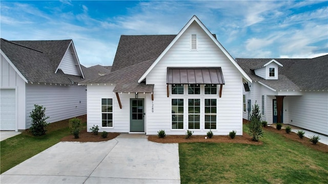 016 Crossing Ct E, Valley, AL 36854 - modern inspired farmhouse featuring a front lawn and a shingled roof