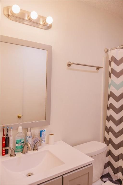 2401 11th Ave, Valley, AL 36854 - full bath with vanity, toilet, and curtained shower