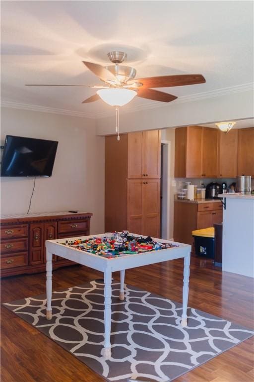 2401 11th Ave, Valley, AL 36854 - rec room with ceiling fan, crown molding, and dark wood-style flooring