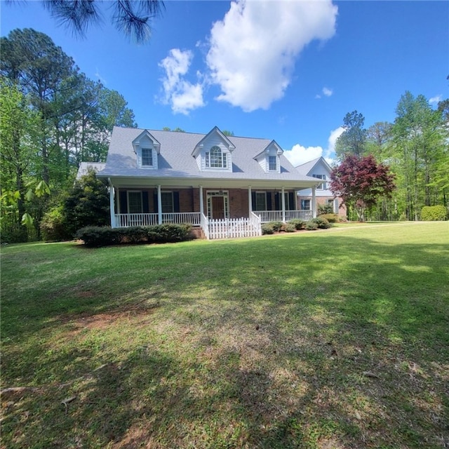 1155 County Road 517, Lanett, AL 36863 - cape cod home with covered porch and a front lawn